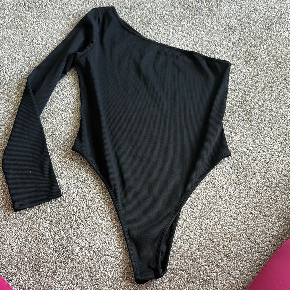 One shoulder body suit.  Ribbed.  2 pulls.